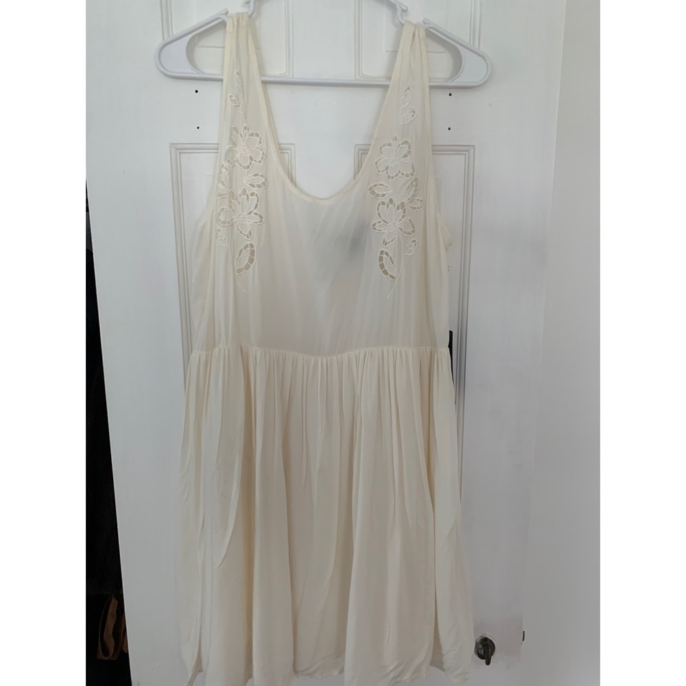 Cream short dress with floral detailing